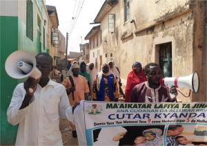 Community mobilizers in Kano State announce the measles campaign