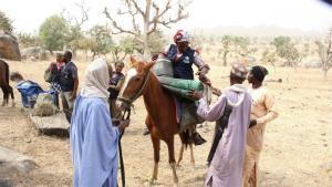 Woman reaching vulnerable populations with vaccines