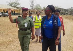 Dr Onyibe (right) leading other personnel on contact tracing.jpg (