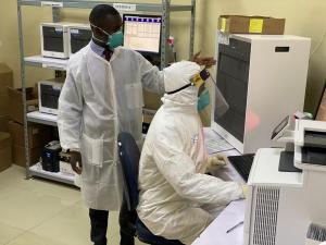 Dr Andrew Nsawotebba, head of the Mutukula Port Health Laboratory explains sample handling at the lad