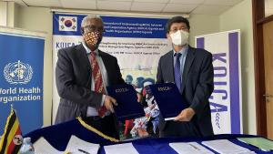   WHO Representative in Uganda, Dr Yonas Tegegn Woldemariam and KOICA Country Director, Mr. Kim Taeyoung upon signing the agreement to improve RMNCAH services in Busoga sub-region