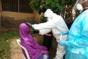 Health worker taking COVID-19 sample in Makarfi LGA in Kaduna state