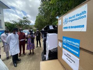 The Hon. Minister of Health and Sanitation, Dr Wurie, the WHO Representative Mr Liyosi and officials inspecting the consignment that was donated to the Ministry of Health and Sanitation