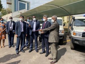 Ministry of Health Director of Clinical Services, Dr. Charles Olaro officially receives the ambulances from the Ambassador of Korea to Uganda H.E Ha Byung-Kyoo and WHO Representative in Uganda Dr Yonas Tegegn Woldemariam