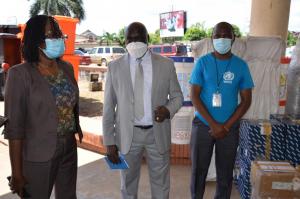 Health Min. Dr. Jallah, WHO Country Rep. Dr. Clement and WHE Cluster Lead Dr. Monday during the donation ceremony in Monrovia