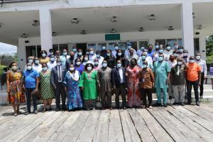 Group photo of senior officials from the Ministry of Health and Sanitation including the Chief Medical Officer, the two  Deputy Chief Medical Officers (Public Health and Clinicals), Directors, Managers and technical and management officials and of their counterparts from the WHO Country Office at the retreat