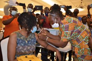 Health Minister, Dr. Wilhelmina Jallah receiving first shot of the COVID-19 vaccine during the launch in Monrovia