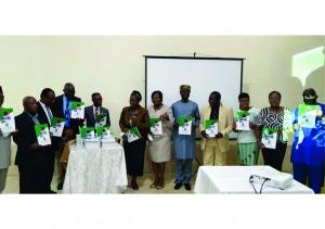 4th from the left, the Deputy WR and dignities unveiling the first Nigeria National Essential Diagnostics List (NEDL).j