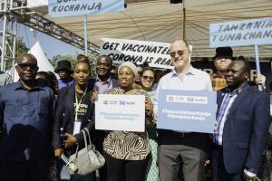 Ted Chaiban with the Minister for Health and WHO Country Representative at the Trade Fair in Dar es Salaam