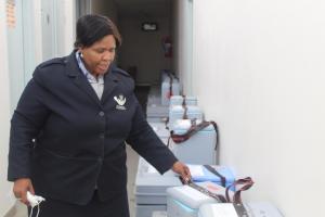 Julia Molapisi, the Acting Senior Health Programme Officer in the Ministry of Health and Social Services in the Omaheke region is pictured here with vaccines. The vaccines were packed in vaccine carriers/cold boxes in preparation for Maternal and Child Health days during an outreach programme. 