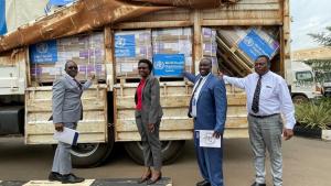 Hon. Dr. Jane Ruth Aceng Acero poses for a photo with Dr. Charles Njuguna (second from right), the WHO Uganda Incident Manager/Emergency Preparedness and Response (EPR) Cluster Lead during the hand-over ceremony of in-kind contributions of medical supplies worth USD 1,123,672 to address the health impact of the drought and food insecurity affecting 19 districts of Karamoja, Lango, and Teso regions in Uganda.