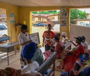 A health worker holding a FP/cervical cancer awareness talk in a clinic in Idanre , Ondo State 