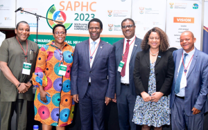A distinguished lineup from left to right: Dr. John Koku Awoonor-Williams (WHO South Africa), Dr. Sithembile Dlamini-Nqeketo (WHO South Africa) Deputy Minister Sibongiseni Dhlomo (NDOH), Dr. Owen Kaluwa WHO South Africa Representative, Dr Nonhlanhla Dlamini WHO Ethiopia Deputy Country Representative and Mr. Thulani Masilela from the Department of Planning, Monitoring, and Evaluation (DPME), captured in a memorable photo moment during SAPHC 2023 in East London.