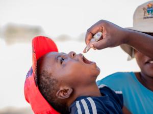 Child receiving polio vaccine