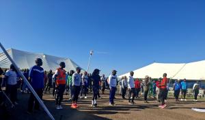 Attendees participating in a pre-event exercise session