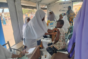Health services provided at a makeshift health site for the people displaced due to the flood. Photo credit