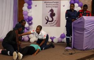 Lesotho’s paramedic team demonstrates how to administer first aid to a patient with leprosy during the commemoration of World Epilepsy Day.