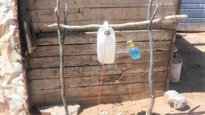Hand-washing stations are being constructed in informal settlements with the help of community health workers and civil society organizations 