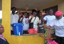 upils of Deaf and Dumb School showing sign of ‘I love you’ to Professor Davidson Munodawafa following a talk on keeping Ebola out of the community