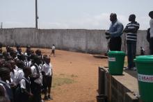  Mr. Francis Tamba from the Ministry of Health giving a talk on food safety to school children in Monrovia