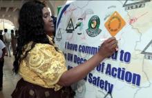  Executive Director SLRTA signing Road safety commitment.