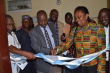 (R-L) Dr Bernice Dahn Minister of Health, Dr Alex Gasasira and Dr Walter Gwenigale cutting the ribbon to officially open the library