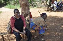 Amina waits in line to visit Mougao, a traditional healer. Engaging influential members of local communities is a crucial part of a strong surveillance system.