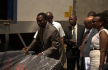 Hon Tumwesigye flags off the mattresses at NMS headquarters