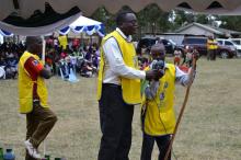 Polio Champion David Otieno speaks during the launch. Migori County health director Dr Joel Gondi is beside him