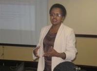 The Deputy Director of Health Services, Ms. Rejoice Nkambule, stressing a point during the workshop