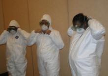 Health Workers in Ebola outbreak locations in West Africa have to be in full gear to avoid contamination
