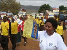 Students and the Holili community marching to mark the WNTD 2009 at Holili town, venue for national level.
