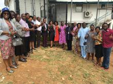 Group photo of the accreditation team with laboratory staff outside the laboratory in Ibadan,