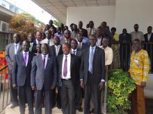 Mr Liyosi Evans (2nd R front row) and the Minister of Health (3rd R front row) in a group phot with meeting Participants