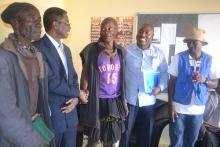 Dr Sagoe-Moses and Mr Shapumba greeting traditional leaders at the Kunene Regional Governor's Office