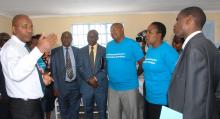 Dr Simon Njuguna, left, national head of mental health, speaks to colleagues among them Dr Dorcas Murage, Medical Superintendent at Gilgil Hospital (second right) and Dr Odongo, extreme right, who presided over World Mental Health day in Kenya