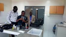 Mr Freeman conducting the first basic test for water quality in the  National Public Health Laboratory