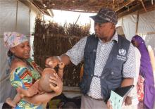 WHO personnel administers cholera vaccine to an eligible beneficiary at Medinatu IDPs camp during the second round OCV campaign in Borno state. Photo:_WHO/CE.Onuekwe