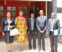 The WHO Representative, Dr. Nathan Nsubuga Bakyaita with members of staff of the WHO Country Office and Dr. Morkor Newman (second from left) the outgoing acting WHO Representative.