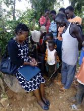 Team member Dr Diana Menya  with community members after  an interview in Keiyo North,  Elgeyo Marakwet County
