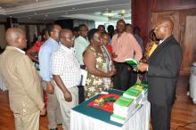 Officials of the Ministry receiving the STG/NEMLIT from Mr George Mlavwasi from the Pharmaceutical and Supplies Unit of the Ministry. 