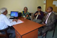 Dr Joy St John, Assistant Director-General Climate and Other Determinants of Health , WHO Geneva, Dr Domun, Director Health Services, Ministry of Health and Quality of Life and Dr L. Musango, WHO Representative in Mauritius, discussing climate change and health during a meeting held at the Mauritius Meteorological Services, Vacoas