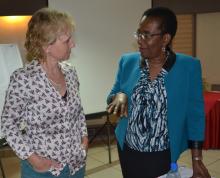 Dr Iheoma Onuekwusi, WHO EPI lead, consults with Dr Hilde Sleurs, MNTE lead consultant 
