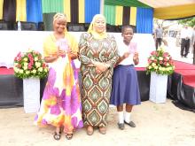 The Guest of Honor, Hon. Vice President posing with some of the girls received vaccination during the occasion