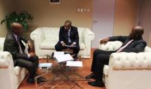 Hon Dr A Madigele, (right) and Hon Mr B Butale (left) both of Botswana MoHW discussing with Dr M Ovberedjo of WHO (centre)