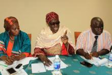 Representative of the Tobacco Control Committee from the Ministry of Education (woman in the middle ) expressing her individual commitment  and that of her institution to controlling the Tobacco epidemic in The Gambia 