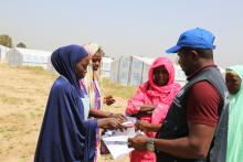 WHO staff provides supportive supervision to anti-malaria mass drug administration team during SMC campaign in Borno state