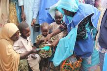 Malaria drug being administered to an eligible child during the SMC campaign