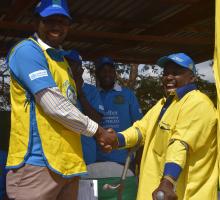 MOH Dr Sam Mahugu, head of Health Promotion with National Immunization Ambassador Mr Harold Kipchumba who has sustained the public call to immunize children against polio