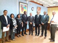 Dr F. Shaikh, WHO Technical Officer, Dr L. Musango, WHO Representative, and Dr J. B. Tapko during a meeting with the Health Minister, Dr. Hon. A. Husnoo (in the centre) and key technical officers and policy makers at the Health Ministry. 